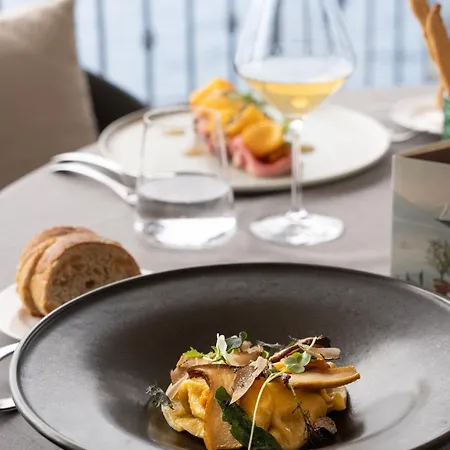 Апартаменты Charming Moment Di Porta - Residenza Leonardo Луино